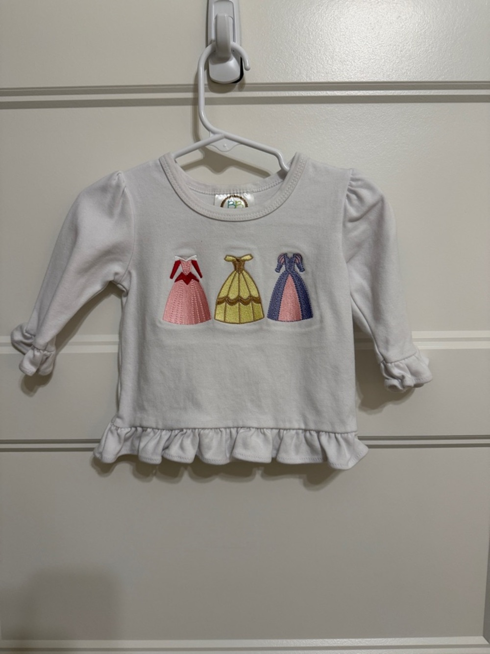 White Baby Top with Pink, Yellow & Blue Dress Applique